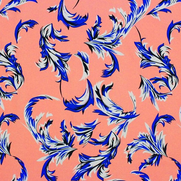 A flat sample of blue feather printed spandex.