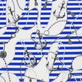 A flat sample of anchors and nautical stripes printed spandex in the color blue-silver.