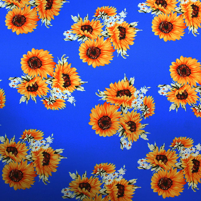 Flat sample of Sunflower Clusters Printed Spandex in color Blue/Yellow