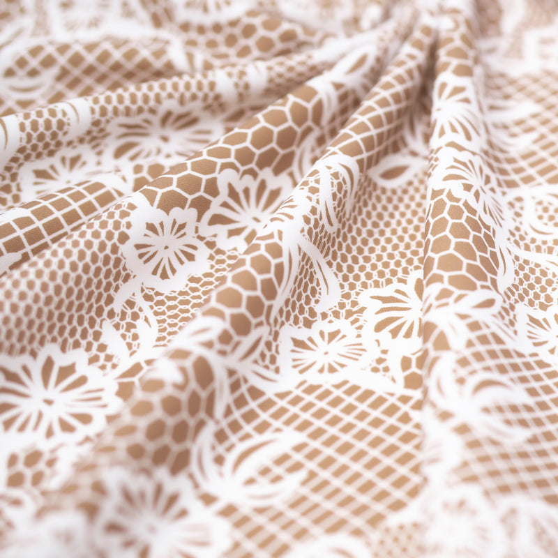 Detailed photograph of White Illusion Lace Pattern on Fawn Printed Spandex