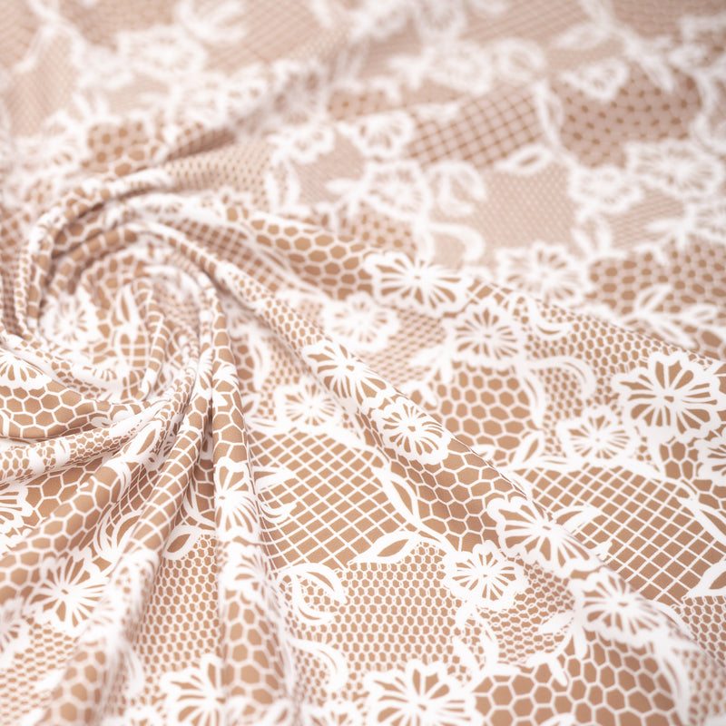 Swirled sample shot of White Illusion Lace Pattern on Fawn Printed Spandex