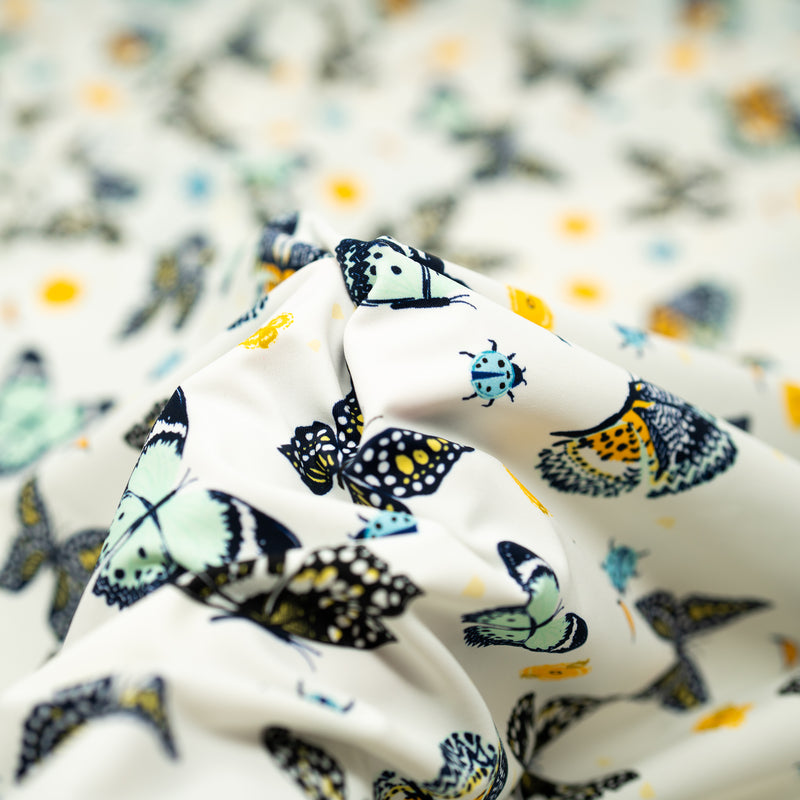 A crumpled piece of Butterflies and Ladybugs Printed Spandex
