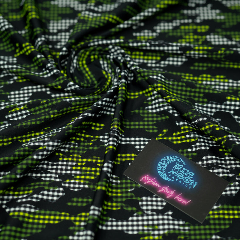 A swirled piece of Camouflage Plaid Printed Spandex