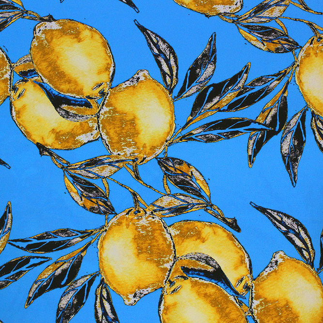 A flat sample of Vintage Lemons on Blue Ground Printed Spandex Fabric