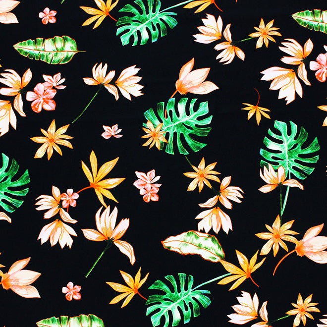 A flat sample of Painted Monstera Leaves Printed Spandex Fabric in Multi Color