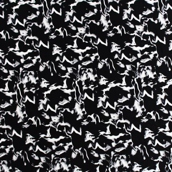A flat sample of white Marble Printed Spandex on black.