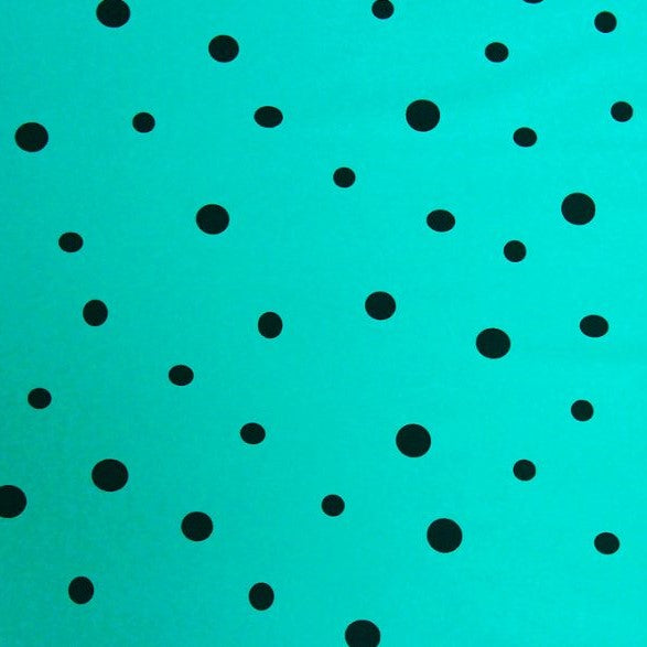 A flat sample of dots on teal printed spandex.