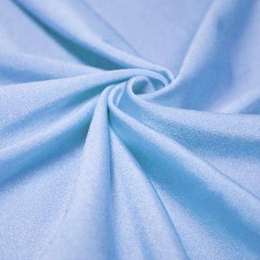 A swirled piece of shiny nylon spandex in the color bouquet.