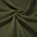 A swirled piece of shiny nylon spandex in the color dusty olive.