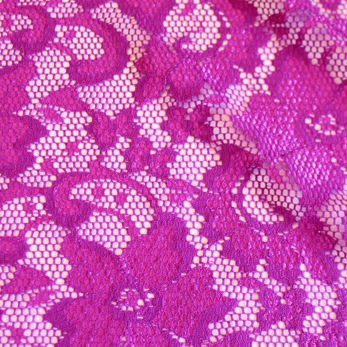 A flat sample of nadia scalloped stretch lace in the color bright pink.