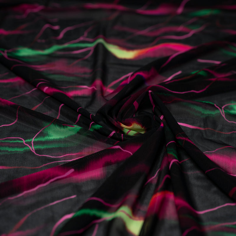 A swirled piece of Neon Northern Lights Printed Power Mesh