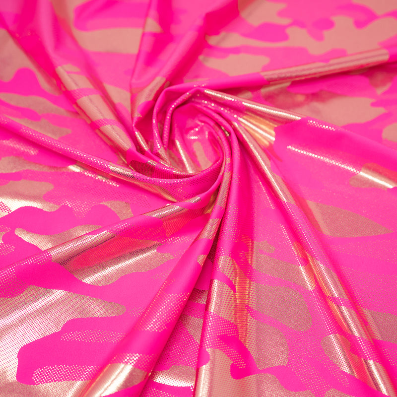 Detailed shot of Neon Nugi Foil Printed Cationic Spandex in color Fluorescent Pink Gold.