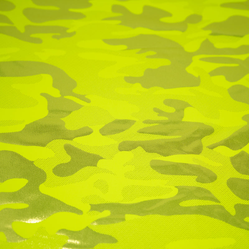Detailed shot of Neon Nugi Foil Printed Cationic Spandex in color Fluorescent Yellow Gold.