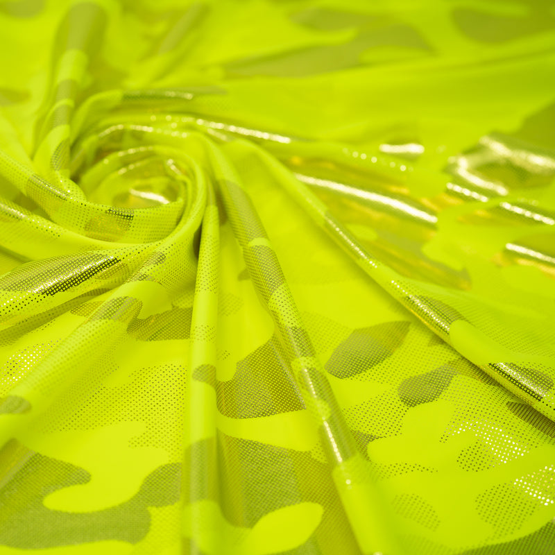 Detailed shot of Neon Nugi Foil Printed Cationic Spandex in color Fluorescent Yellow Gold.
