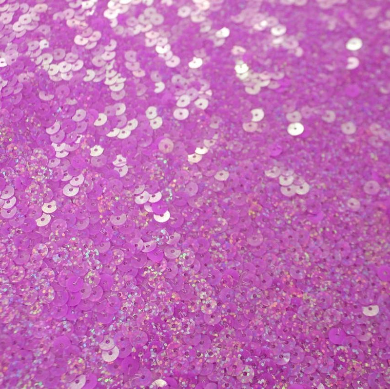 A flat sample of dayglo spandex sequin in the color neon purple.