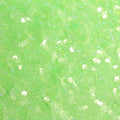 A flat sample of dayglo spandex sequin in the color neon lime.