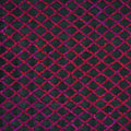 A flat sample of nina stretch mesh sequin in the color black-fuchsia.