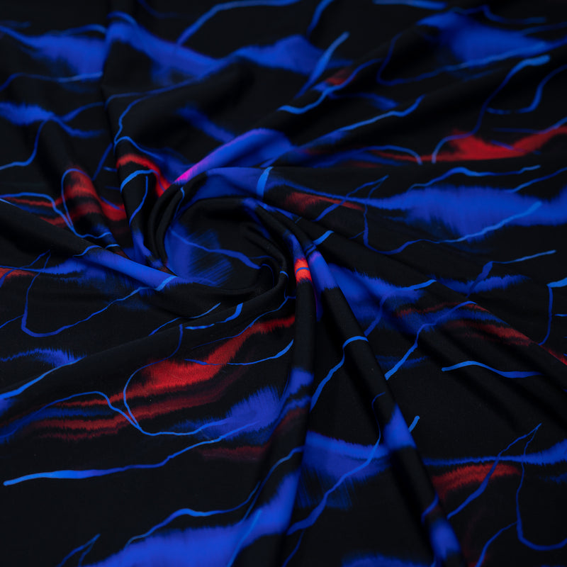 A swirled piece of Northern Lights Printed Spandex
