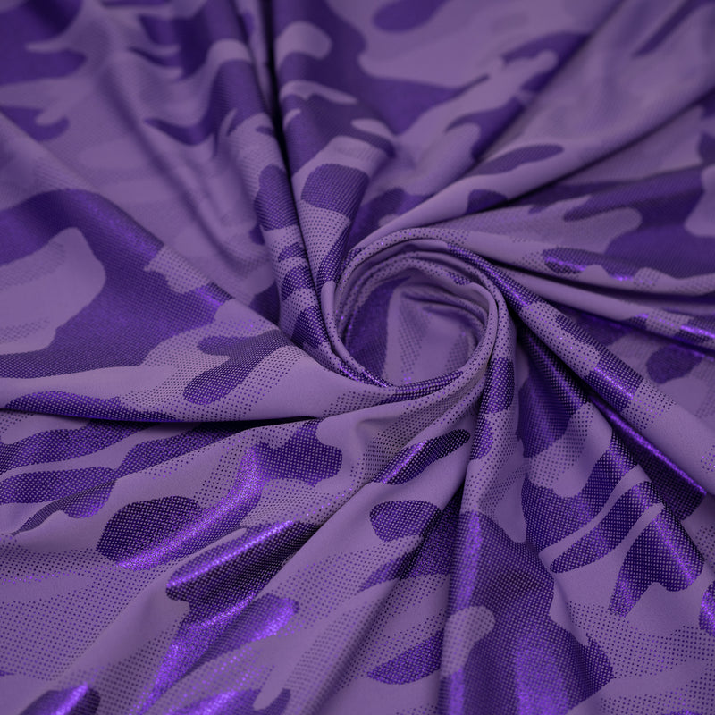 A swirled sample of Nugi Foil Printed Spandex in Lavender/Purple.