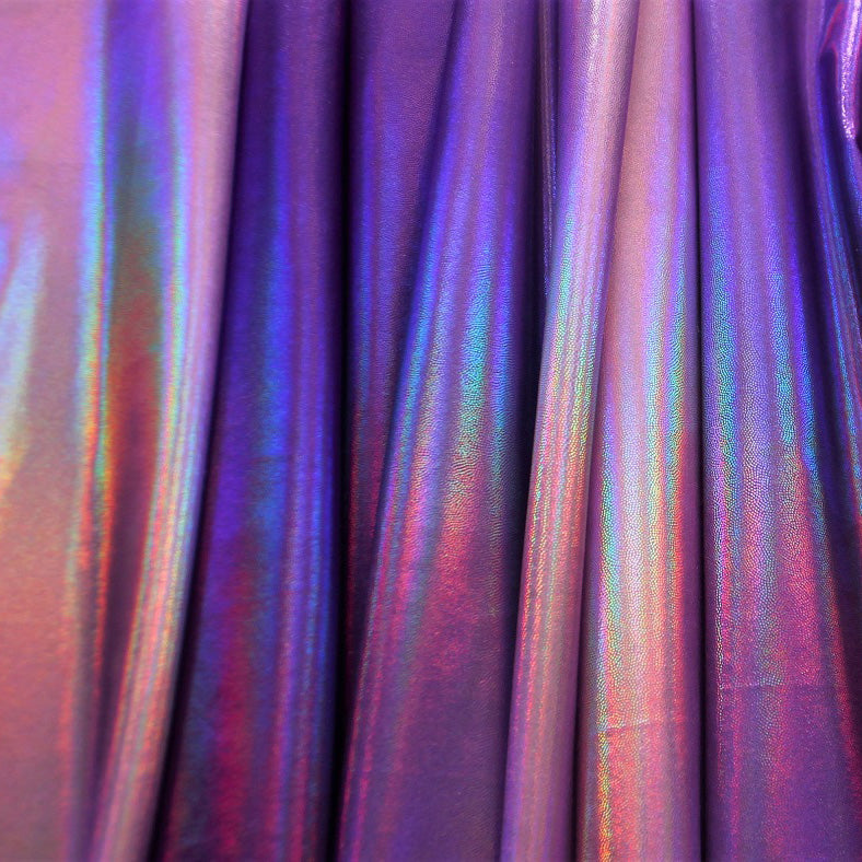 A draped sample of ombre dizzy  foiled spandex in the color lavender.