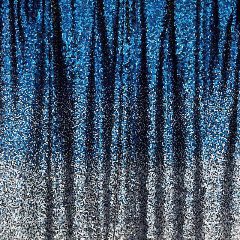 A draped sample of ombre stretch mesh sequin in the color blue-silver.