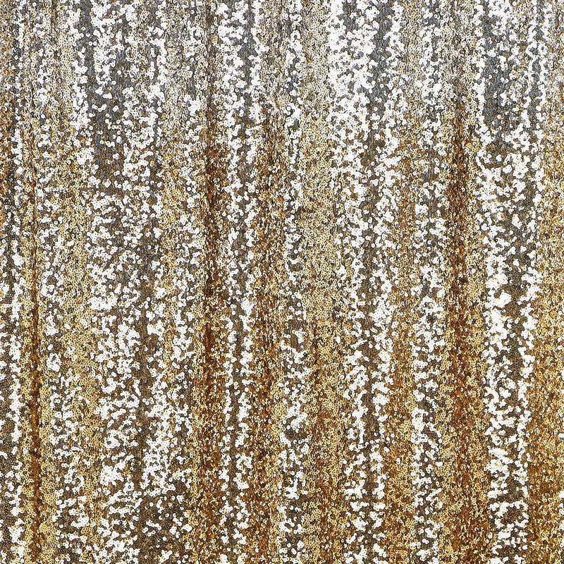 A draped sample of ombre stretch mesh sequin in the color silver-gold.