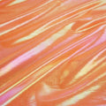 A flat sample of opal foiled spandex in the color orange.