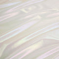 A flat sample of opal foiled spandex in the color white.