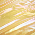 A flat sample of opal foiled spandex in the color yellow.