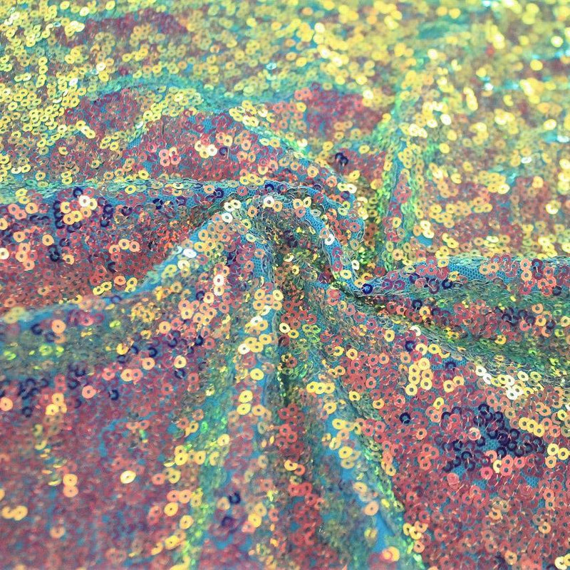A swirled sample of opulence stretch mesh sequin in the color azul.