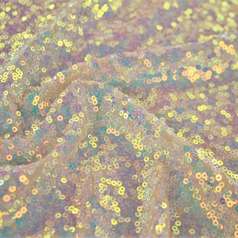A swirled sample of opulence stretch mesh sequin in the color blush-opal.