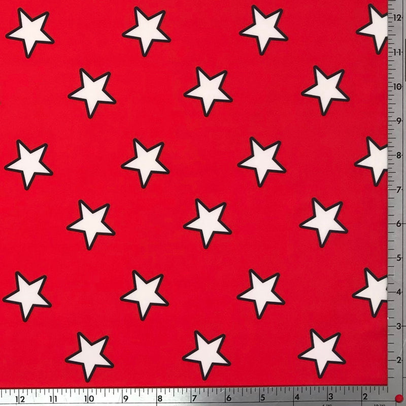 A flat sample of seussy stars printed spandex.