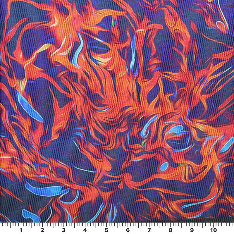 A flat sample of flames printed power mesh with a scale to measure the size of the print.