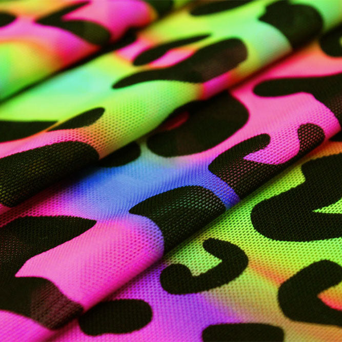A folded sample of groovy leopard printed power mesh.