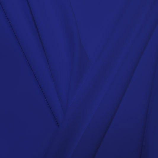 A pleated piece of performance nylon spandex fabric in the color royal blue.