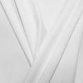 A pleated piece of performance nylon spandex fabric in the color white.