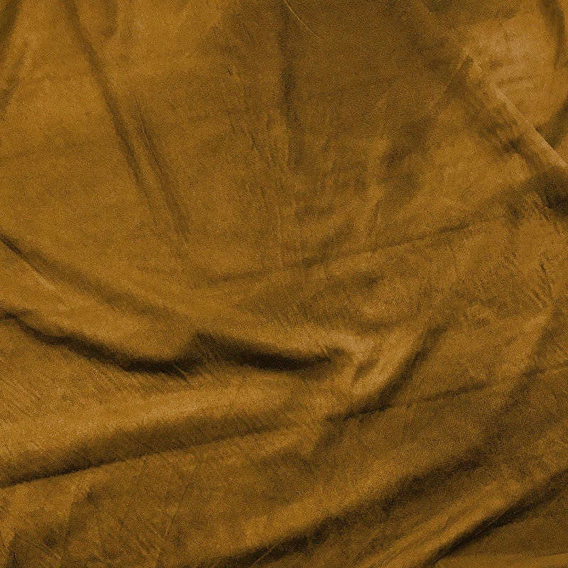 A flat sample of pocahontas stretch faux suede in the color light camel.