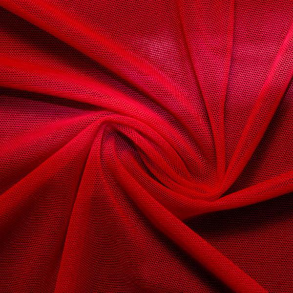 A swirled piece of nylon spandex power mesh in the color blood red.