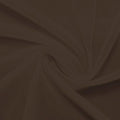 A swirled piece of nylon spandex power mesh in the color brown sugar.