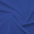 A swirled piece of nylon spandex power mesh in the color cerulean.