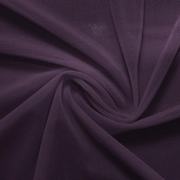 A swirled piece of nylon spandex power mesh in the color eggplant.