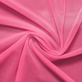 A swirled piece of nylon spandex power mesh in the color hot pink.