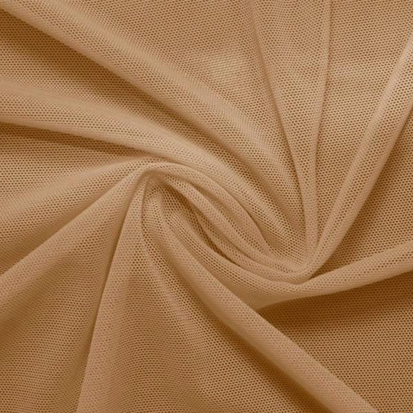 A swirled piece of nylon spandex power mesh in the color latte.