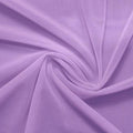 A swirled piece of nylon spandex power mesh in the color lilac.