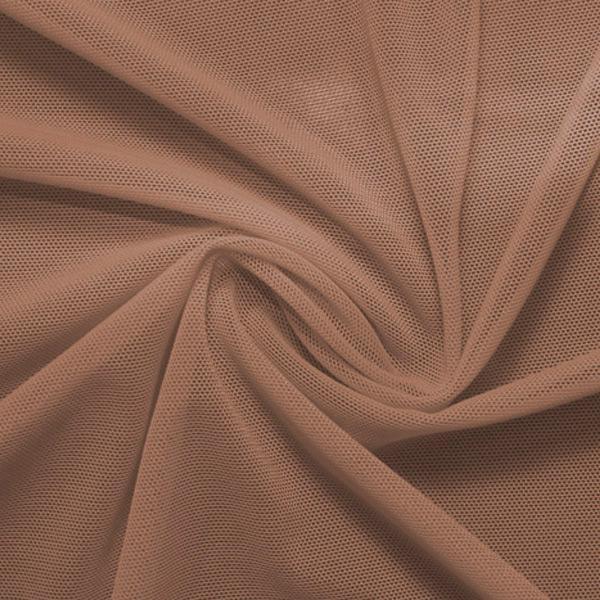 A swirled piece of nylon spandex power mesh in the color mocha.