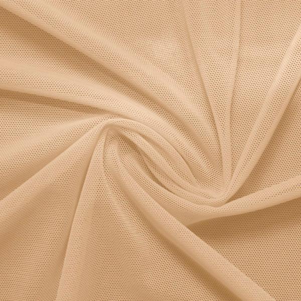 A swirled piece of nylon spandex power mesh in the color naked.