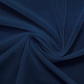 A swirled piece of nylon spandex power mesh in the color navy.