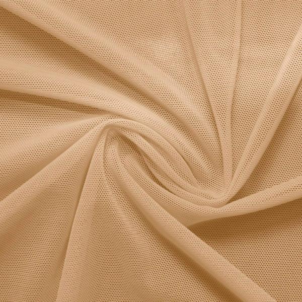 A swirled piece of nylon spandex power mesh in the color new nude.