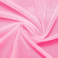 A swirled piece of nylon spandex power mesh in the color pink.