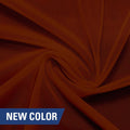 A swirled piece of nylon spandex power mesh in the color picante.